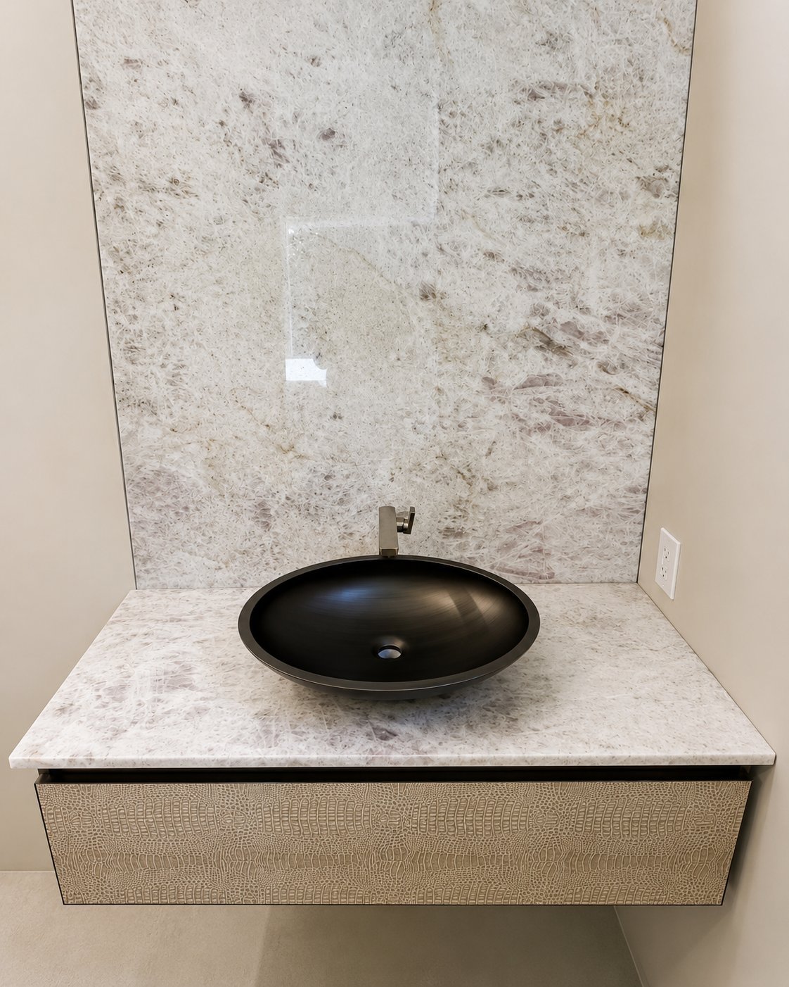 Crystal quartzite vanity with bronze vessel sink